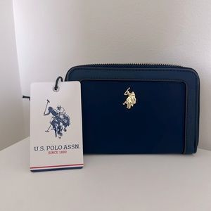 U.S. Polo Houston Large Zip Around Wallet looks like a tori Burch